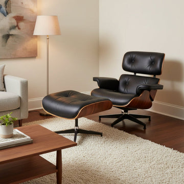 Black leather lounge chair and ottoman arranged in a modern living room