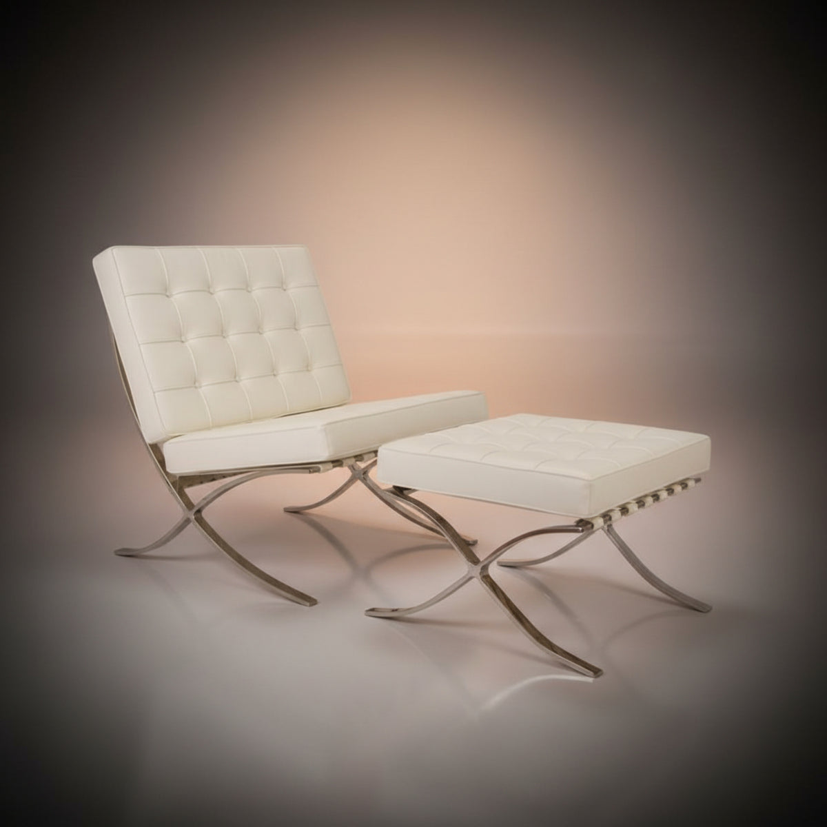A modern tufted lounge chair with a matching ottoman, upholstered in off-white leather with polished chrome S-shaped legs