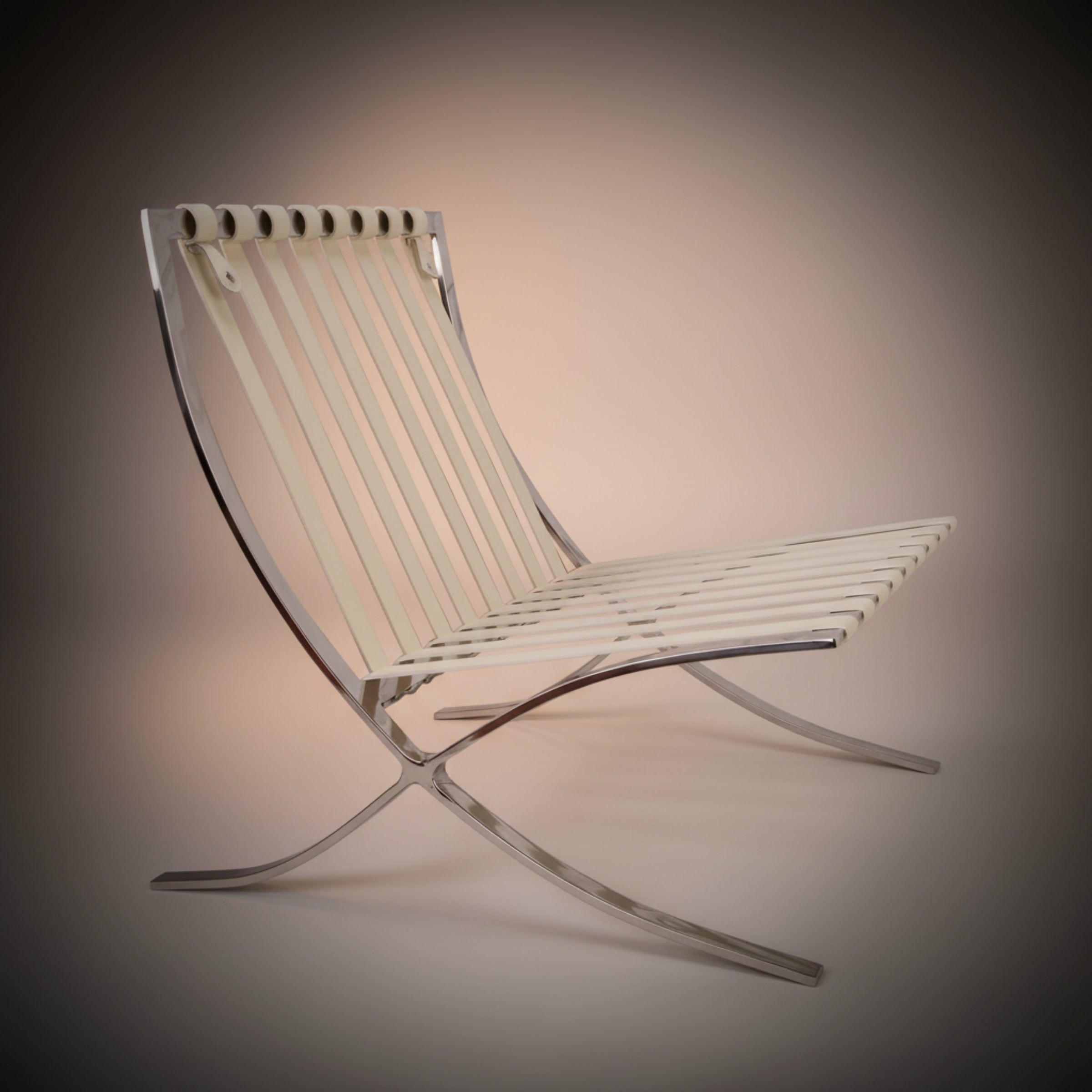 A modern curved lounge chair with a white slatted seat and backrest supported by a chrome metal frame