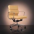 A modern office chair with cream-colored leather upholstery and a polished chrome five-star base