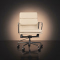 An off-white leather office chair with a high segmented backrest and chrome armrests Eames_Insired_Soft_Pad_Ea217_Soft_Pad_Ivory_White_1