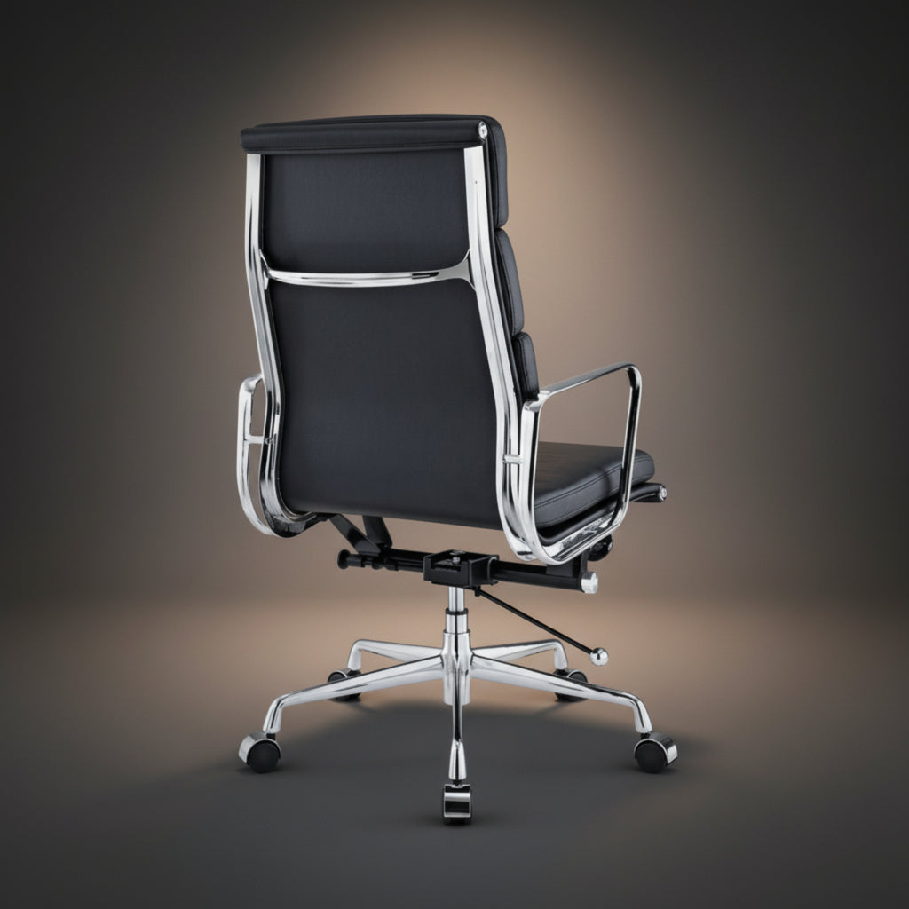 A modern black leather office chair with a high back, chrome metal frame, and a five-star wheeled base