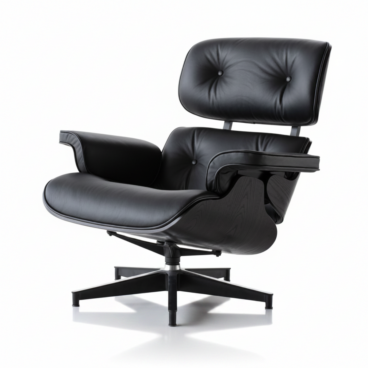 Black leather lounge chair with ottoman on a white background