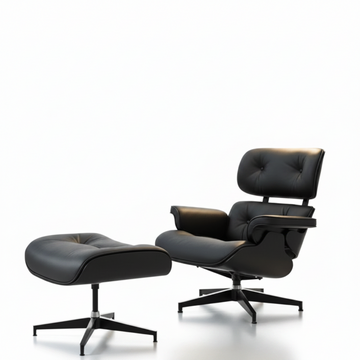 Black leather lounge chair and ottoman on a white background