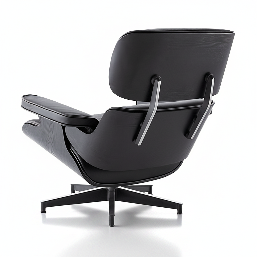Black lounge chair with armrests on a white background
