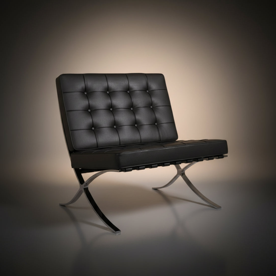A modern black leather tufted lounge chair with a curved chrome metal base, photographed against a dark gray studio