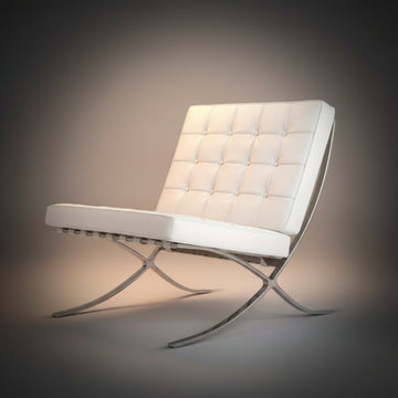 A modern Barcelona-style lounge chair with white tufted upholstery and a chrome metal frame, shown on a dark gray
