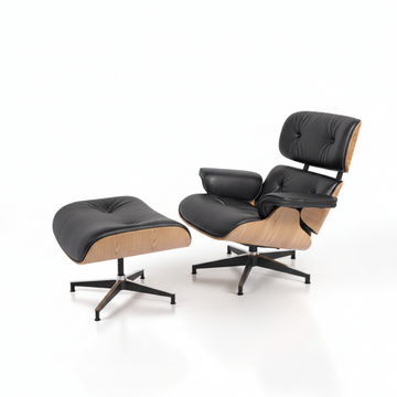 A classic mid-century modern lounge chair with matching ottoman, featuring black leather upholstery