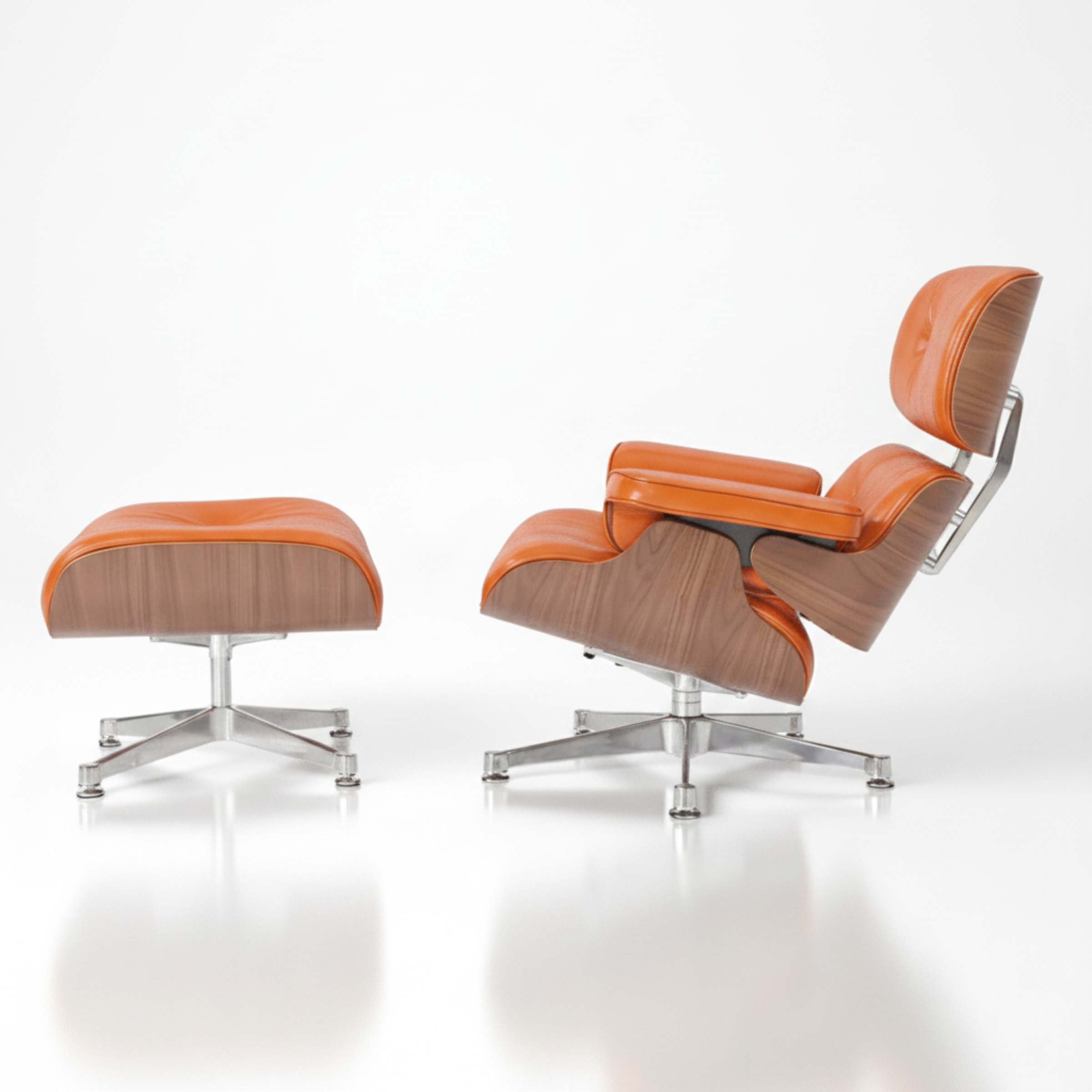 A modern lounge chair with an adjustable headrest and matching ottoman, featuring orange leather upholstery 