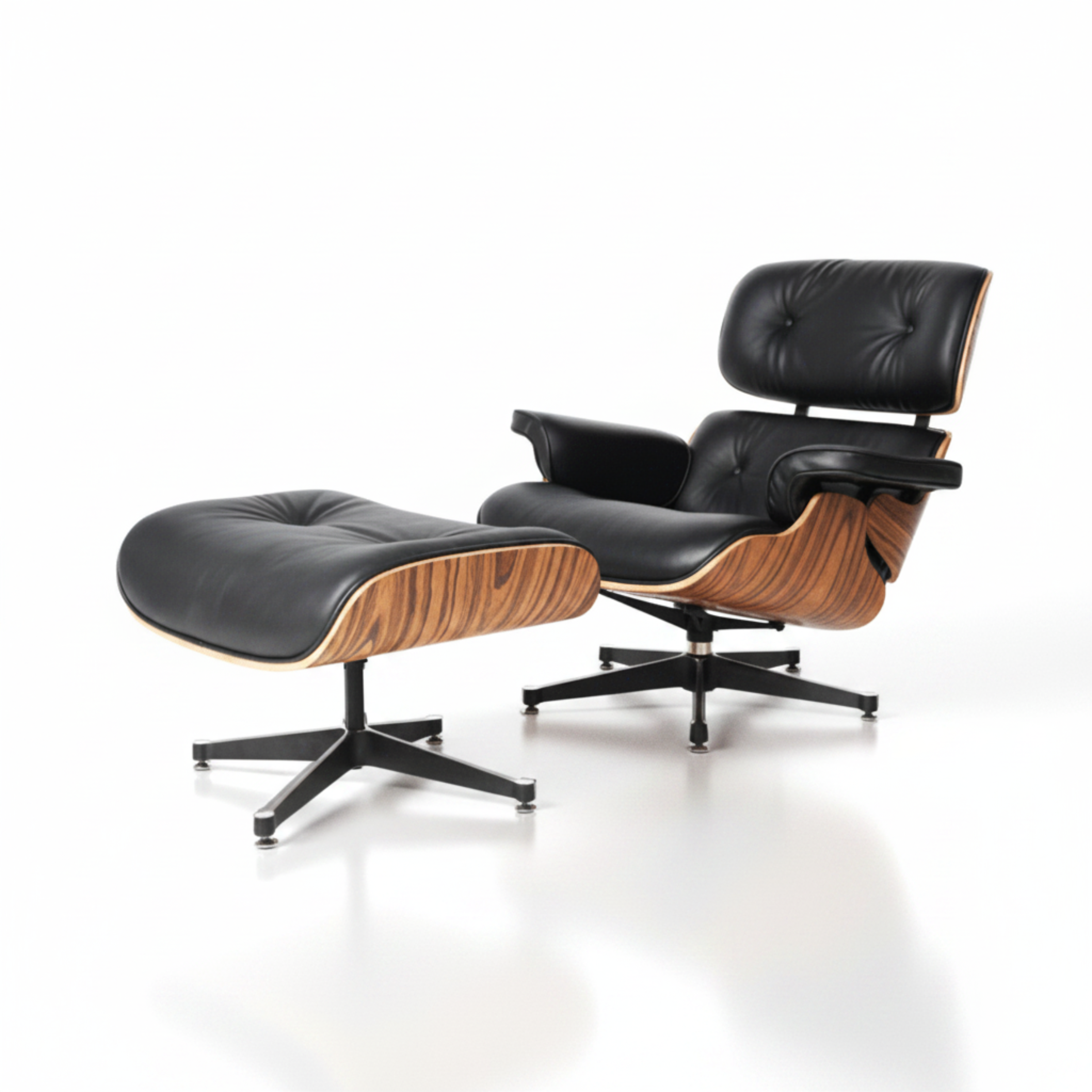 A modern lounge chair with an attached ottoman, featuring black leather upholstery