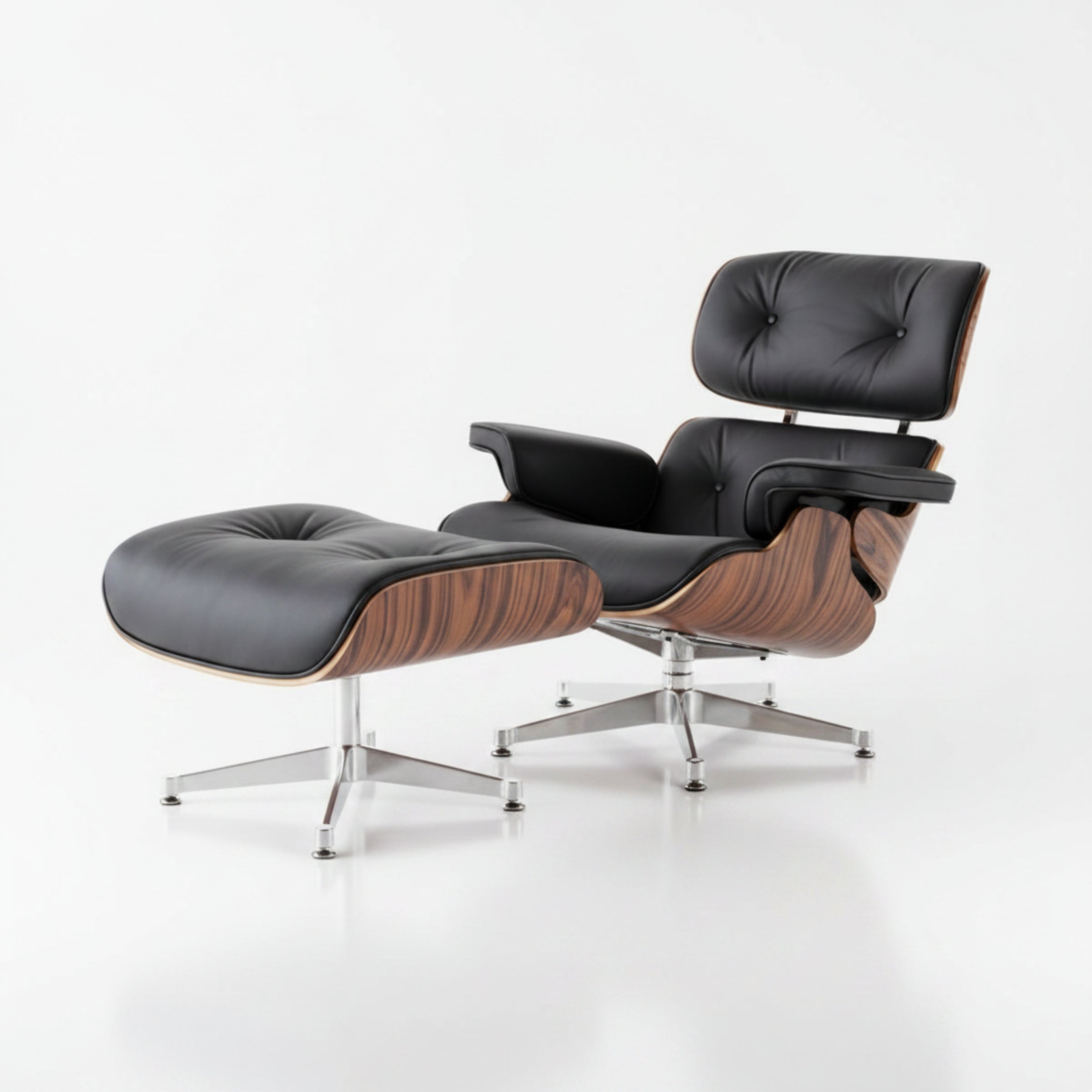 A classic mid-century modern lounge chair with an ottoman, featuring black leather upholstery