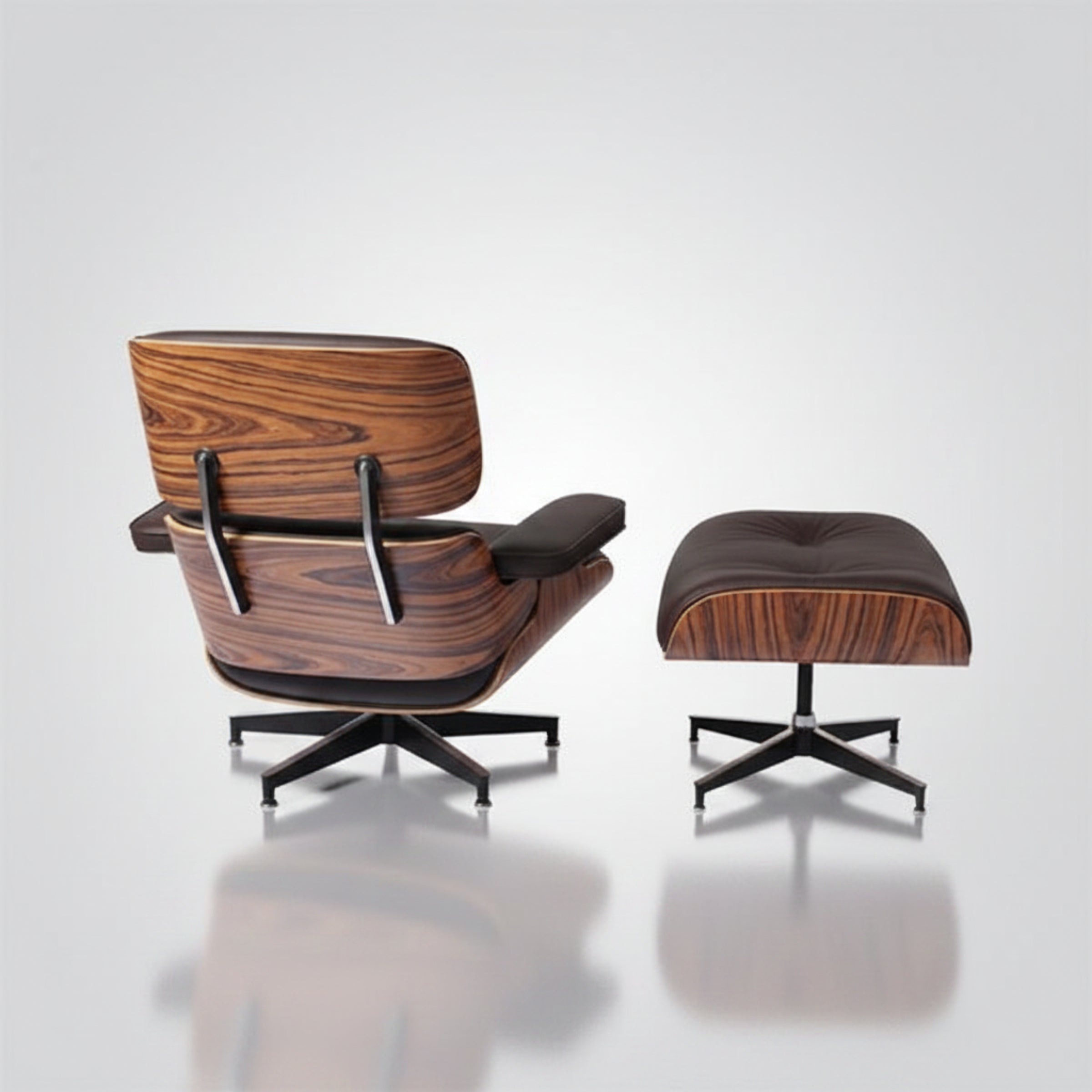 A mid-century modern lounge chair with a matching ottoman, featuring a rich brown wood grain pattern