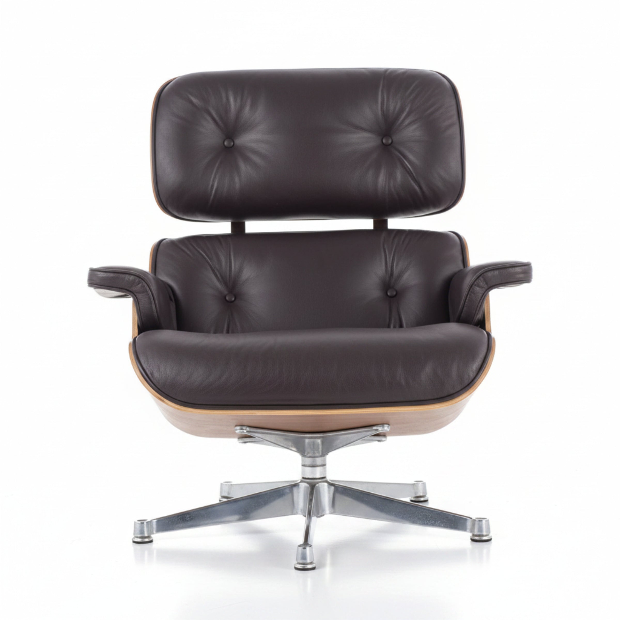 A classic mid-century modern lounge chair with dark brown tufted leather upholstery