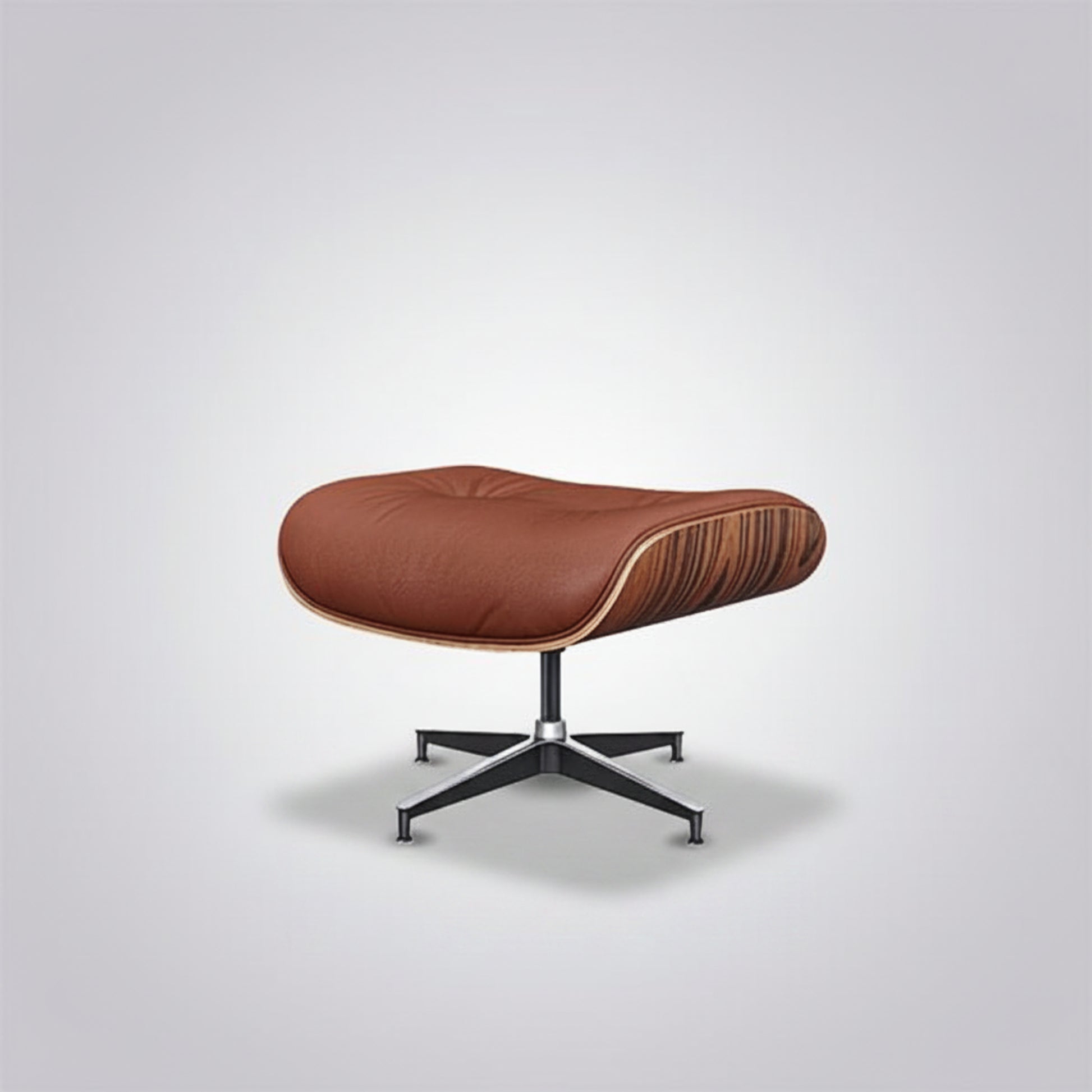 A modern lounge ottoman with a brown leather cushion, a curved wood veneer shell