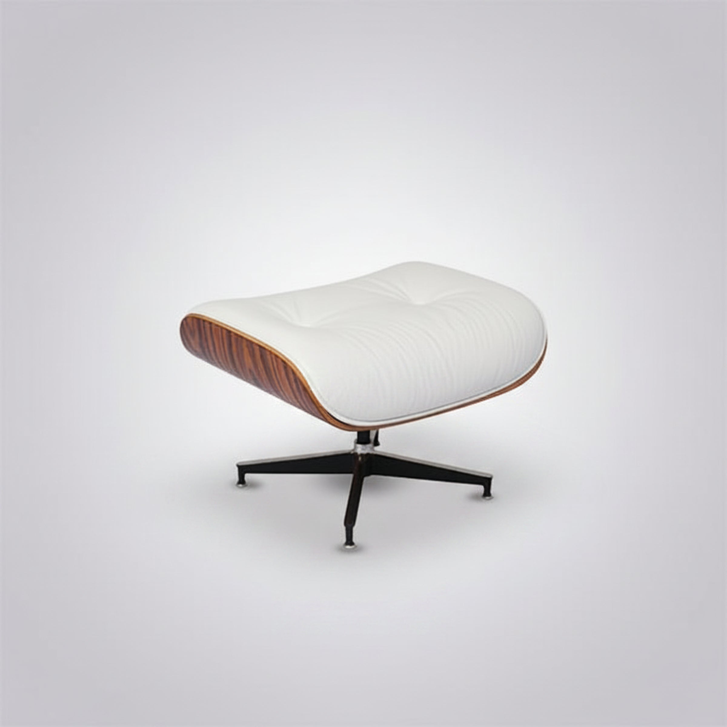A modern lounge ottoman with a curved white tufted cushion, a warm brown wood-grain side panel