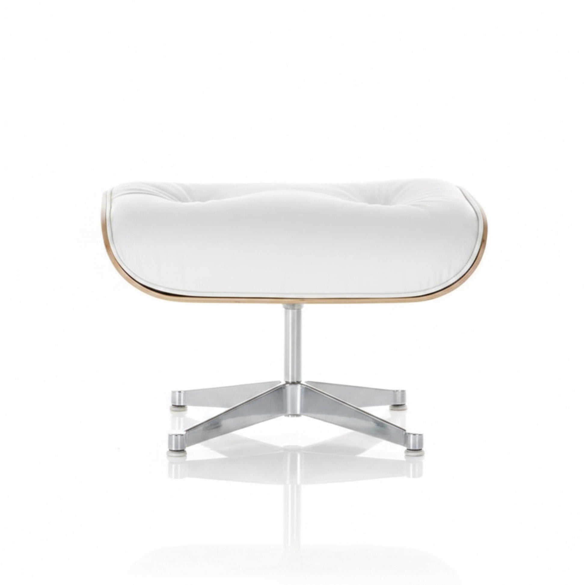 A modern white tufted ottoman stool with a curved wooden frame and a chrome star base