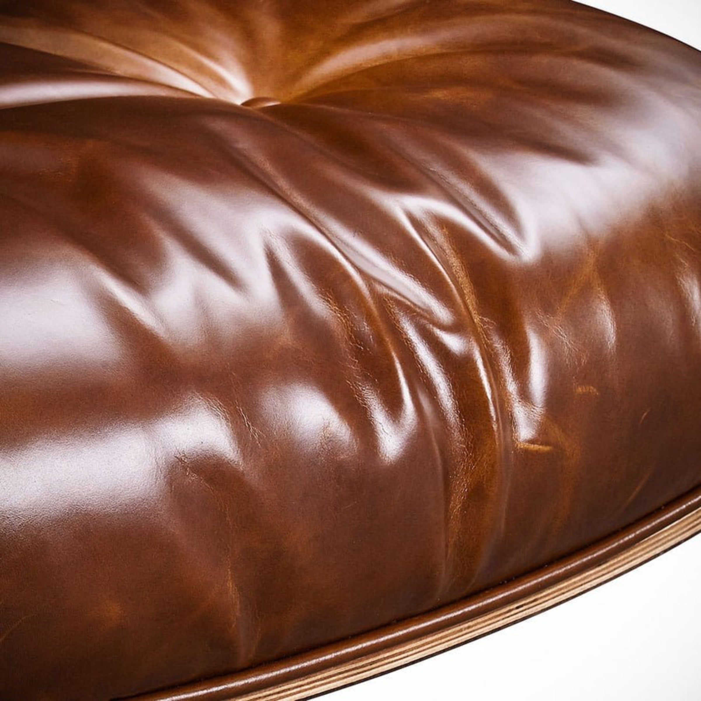 Close-up of a waxed  brown leather with visible texture