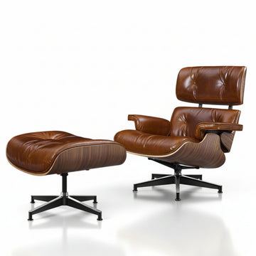 Brown leather chair and ottoman on a white background