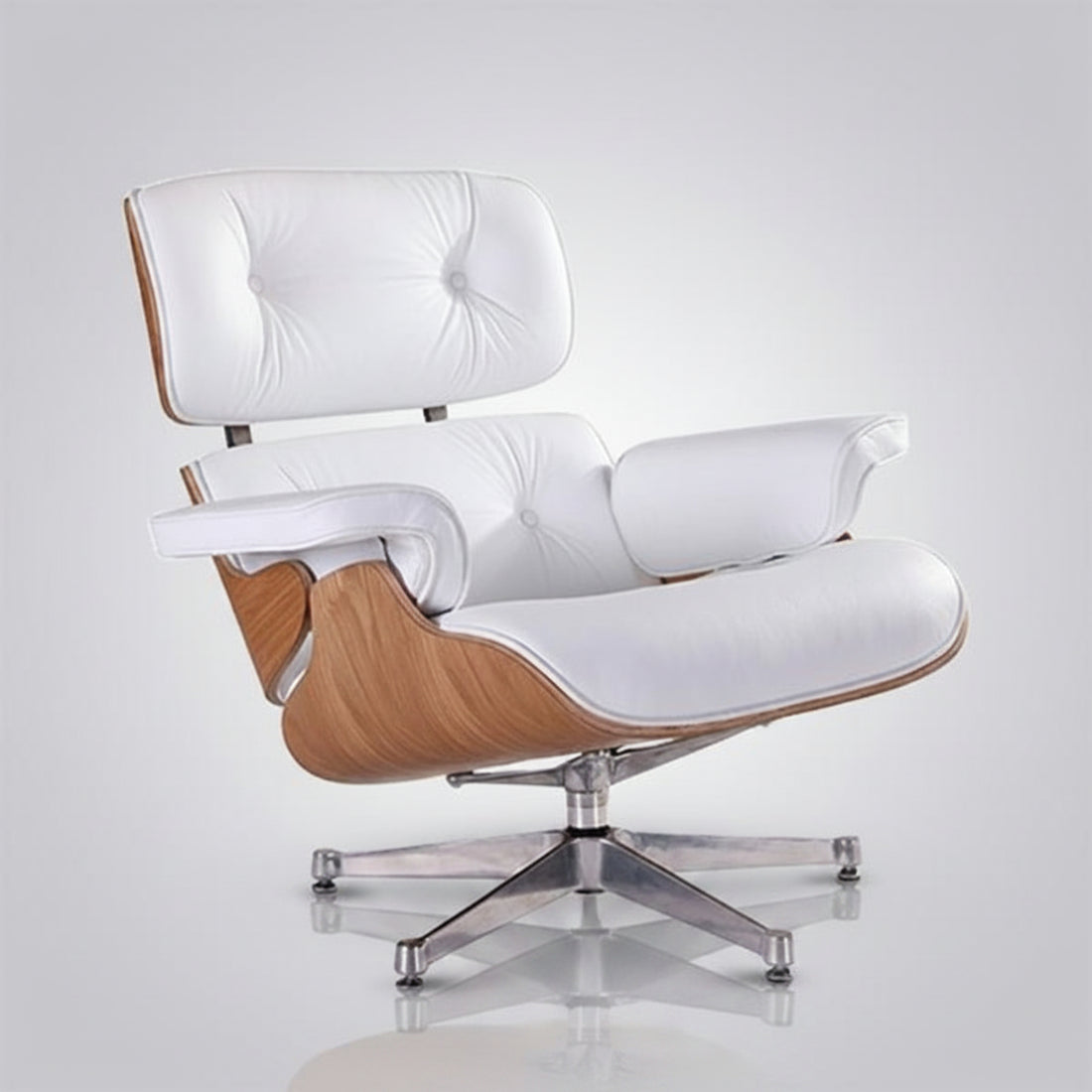 A modern lounge chair with a matching ottoman, featuring white leather upholstery, light wood grain sides
