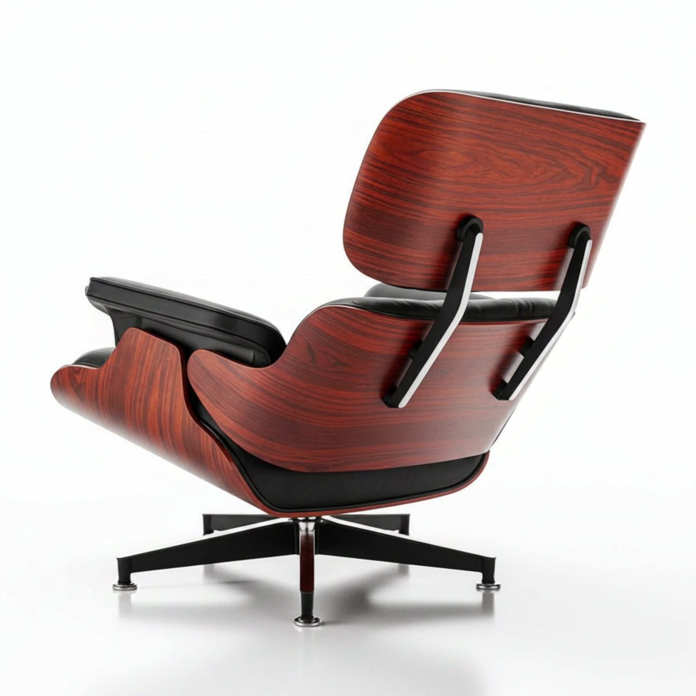 A modern lounge chair with a reddish-brown wood grain shell and black leather seating