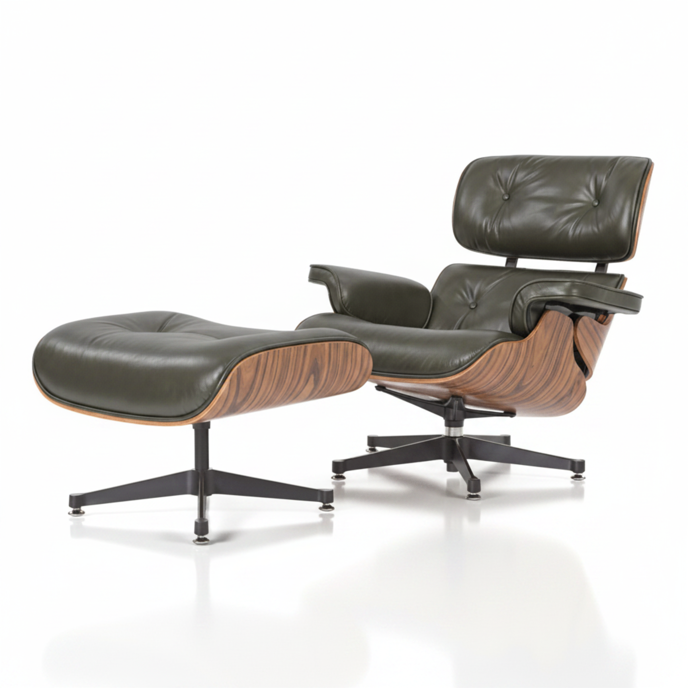 A mid-century modern lounge chair with an attached ottoman, featuring dark olive green leather upholstery