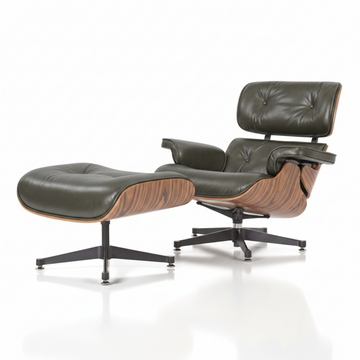 A mid-century modern lounge chair with an attached ottoman, featuring dark olive green leather upholstery