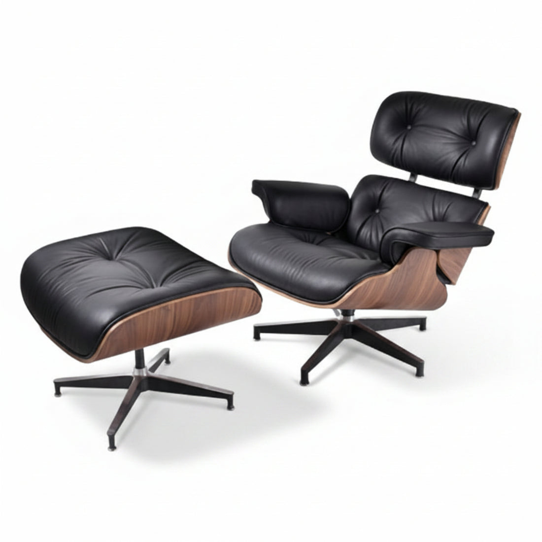 Black leather lounge chair and ottoman on a white background
