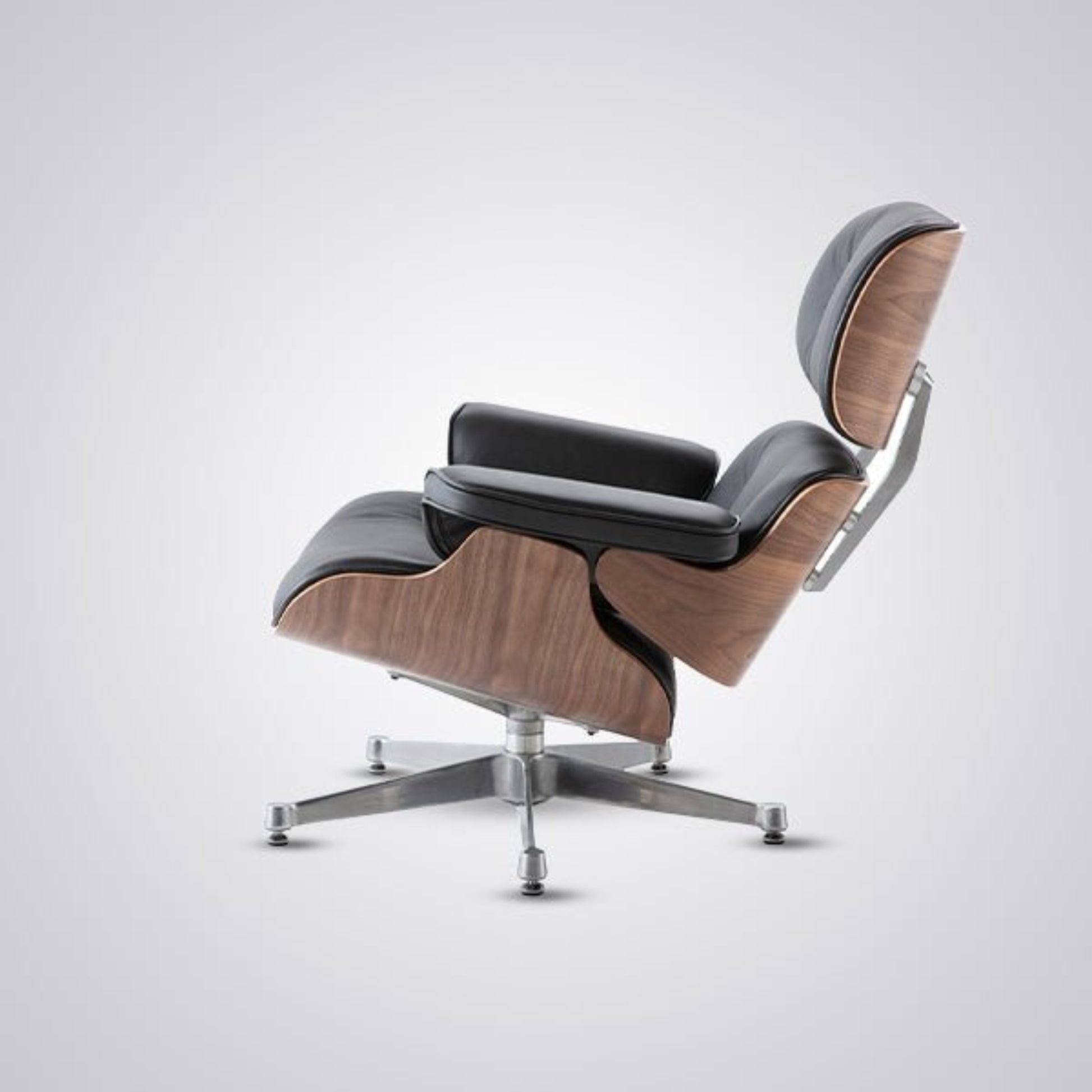 Modern lounge chair with wooden accents and gray cushion on a white background