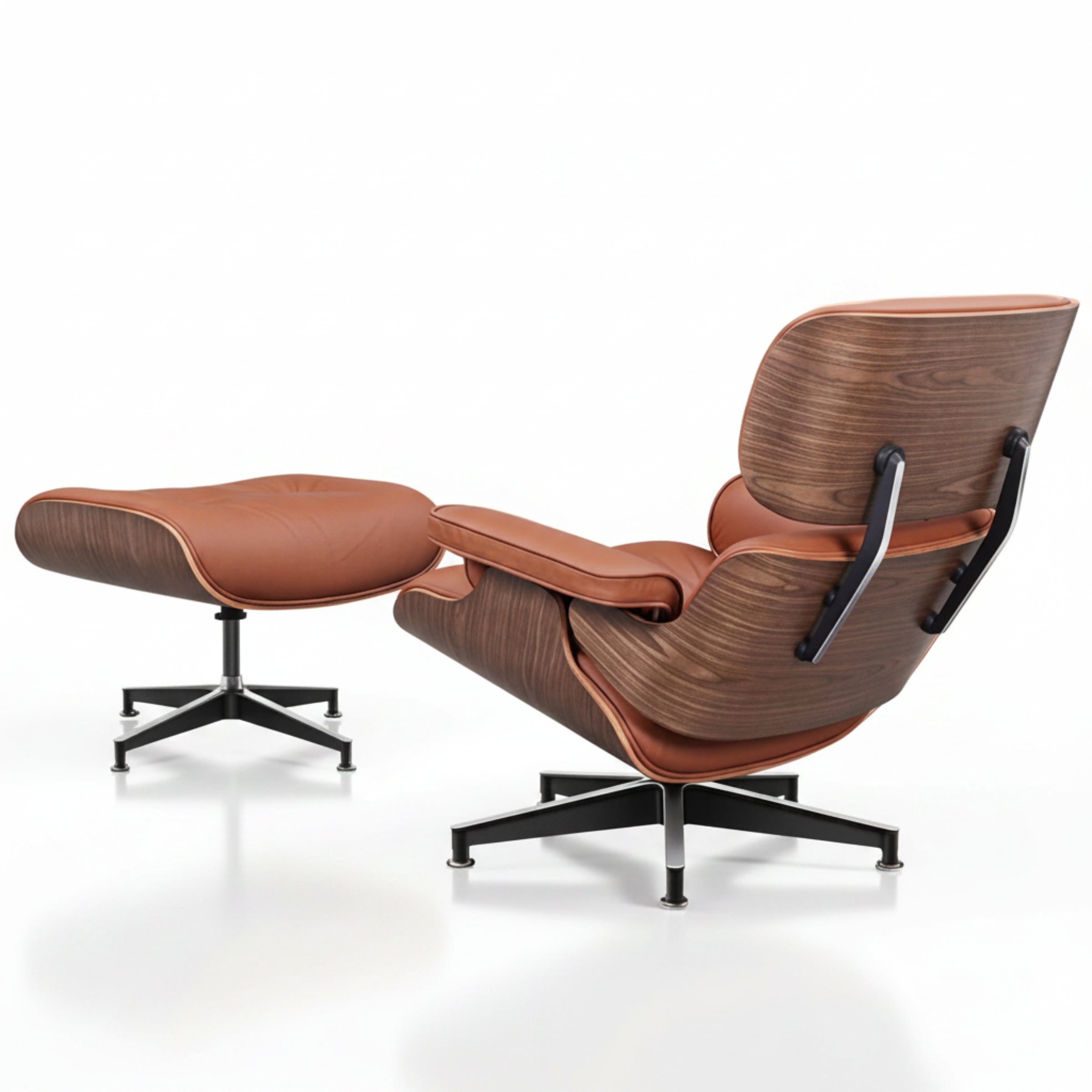 Brown lounge chair and ottoman on a white background