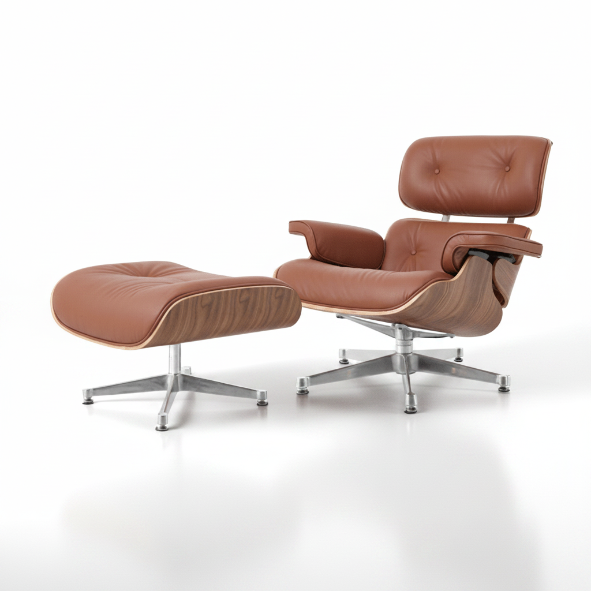 Brown leather lounge chair and ottoman on a white background