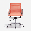 An orange mesh office chair with a chrome five-star base and black casters