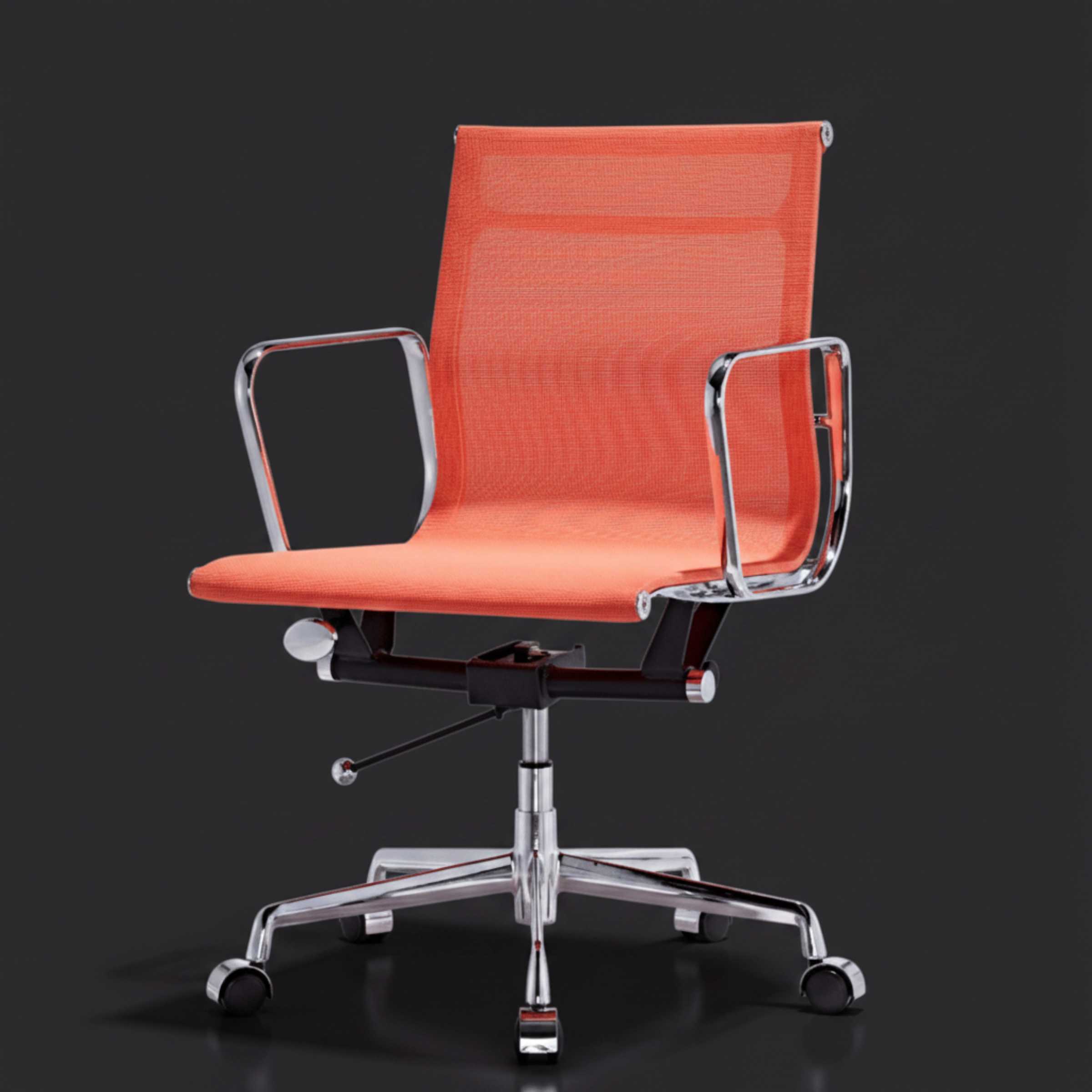 An orange mesh office chair with chrome metal armrests and a five-star wheeled base, shown against a dark gray studio background.