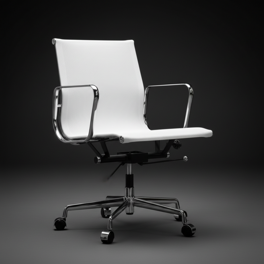 A modern white office chair with a high back, chrome metal armrests and base, and black casters, photographed against a dark gray studio background.