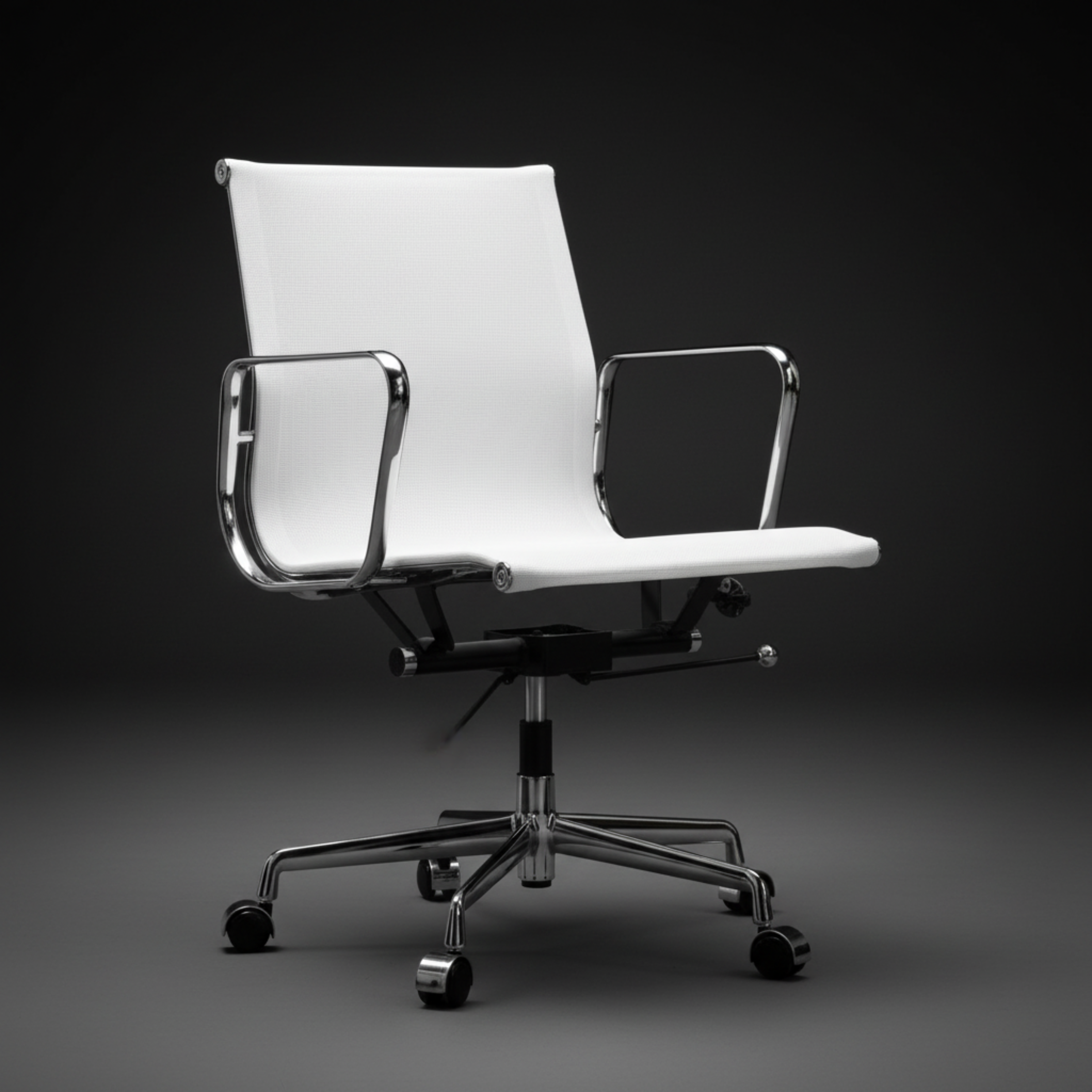 A modern white office chair with a high back, chrome metal armrests and base, and black casters, photographed against a dark gray studio background.