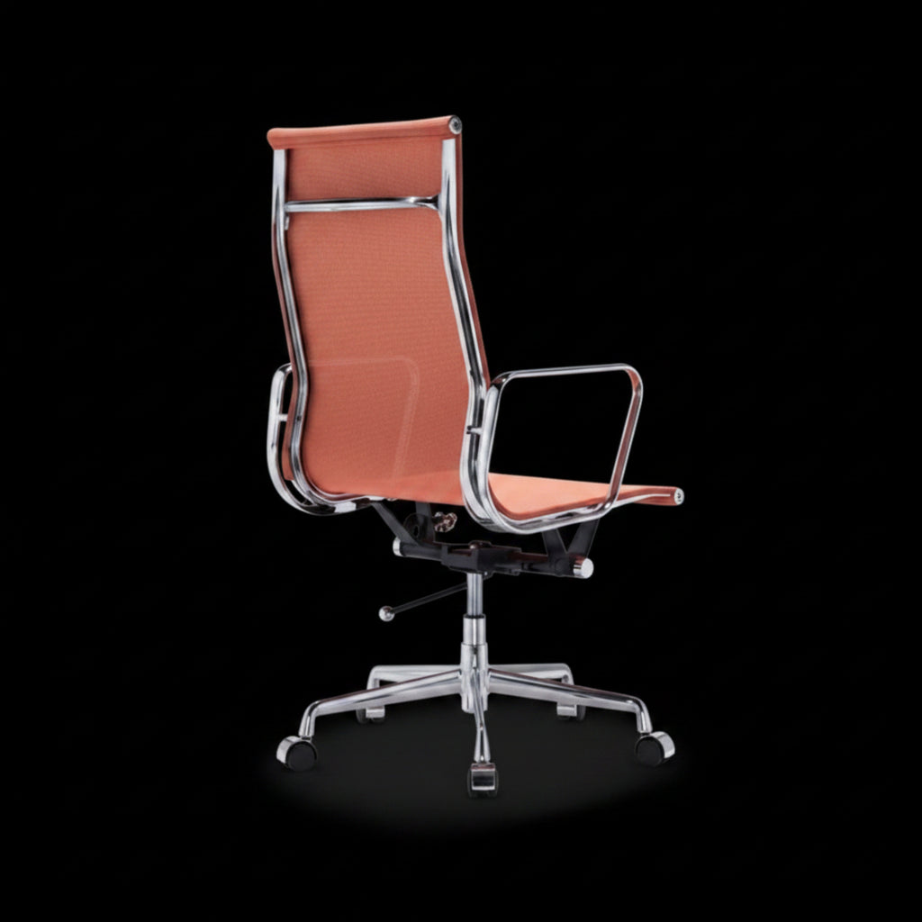 A modern high-back office chair with a textured orange mesh back and seat, supported by a chrome-finished metal frame
