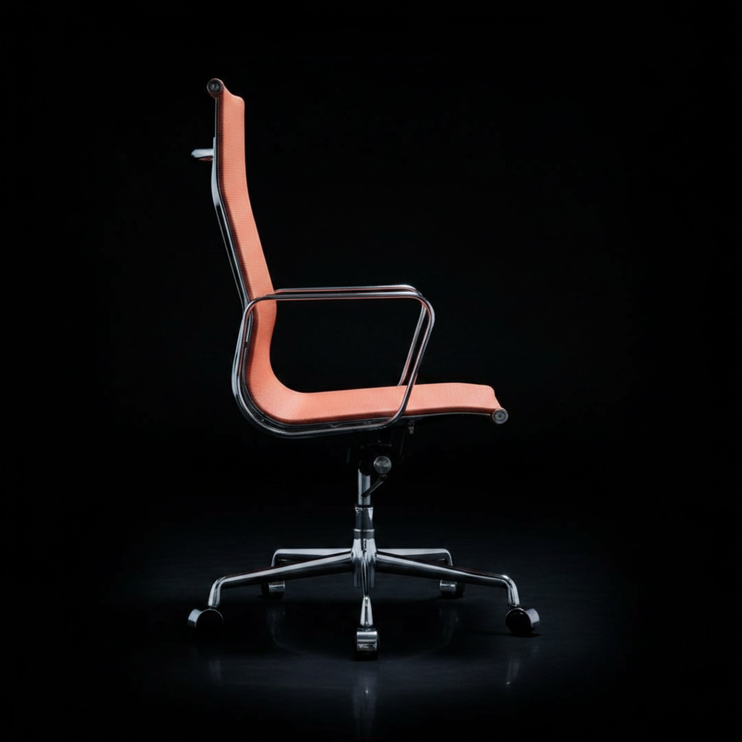A modern office chair with a curved orange-pink upholstered seat and backrest, supported by a chrome five-star base