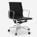 A modern black leather office chair with a high ribbed backrest, chrome metal armrests, and a five-star wheeled base