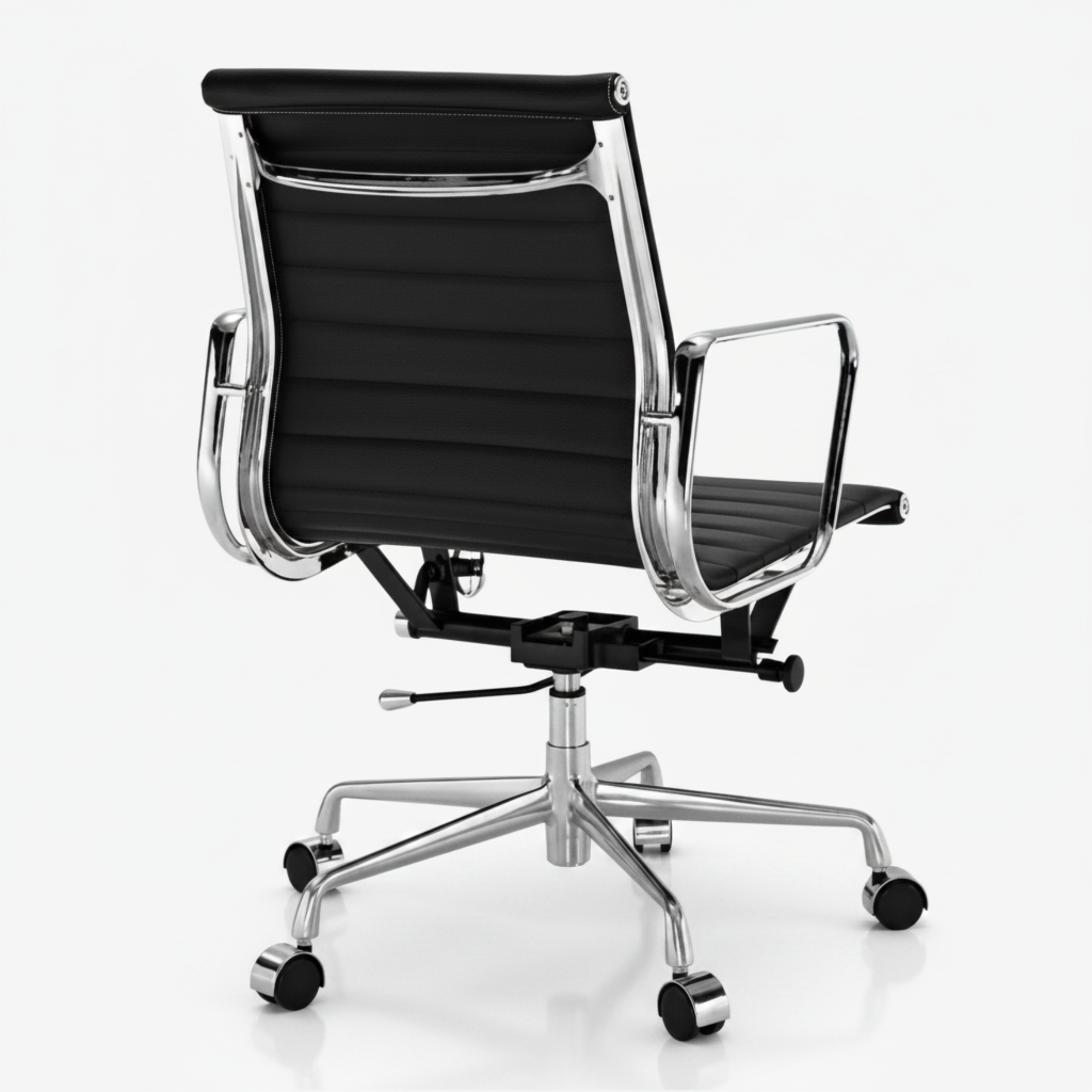 A modern black office chair with a ribbed high-back seat and backrest, featuring a polished chrome five-star base with casters.