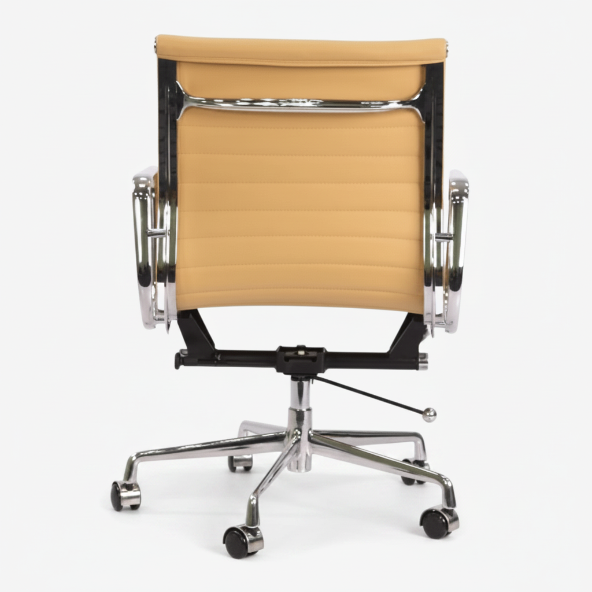 A modern office chair with a curved backrest upholstered in tan leatherette, supported by a black metal frame and chrome five-star base.