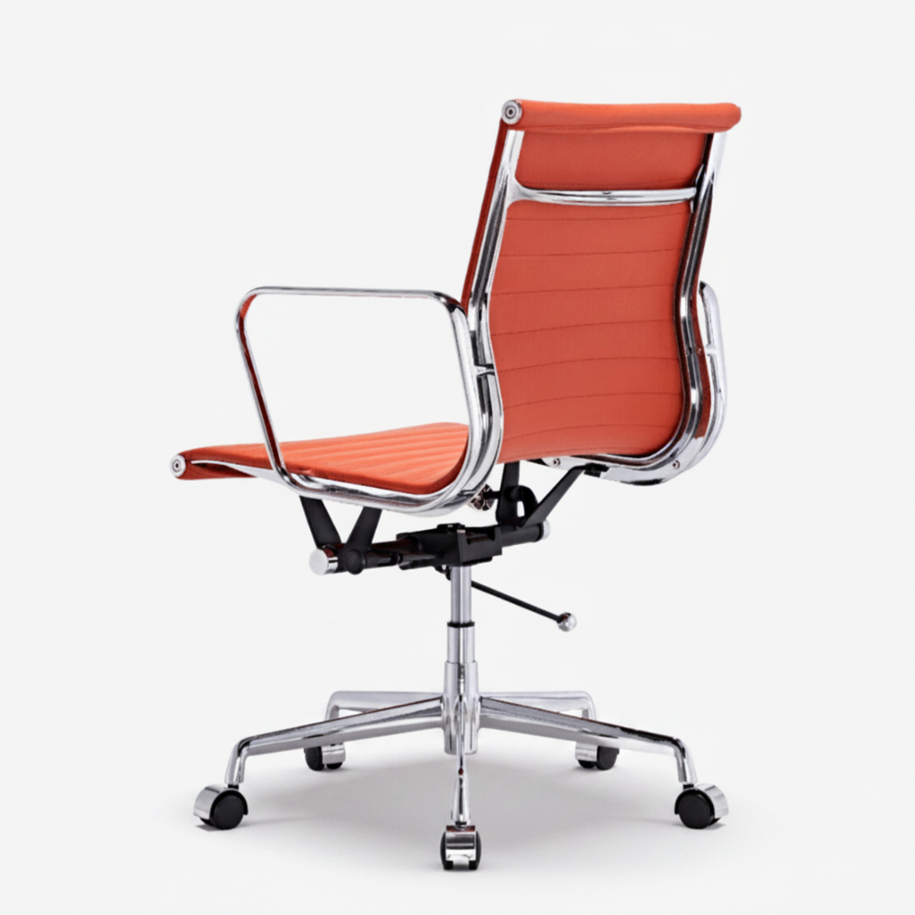 An orange mesh office chair with a chrome metal frame, armrests, and a five-star wheeled base