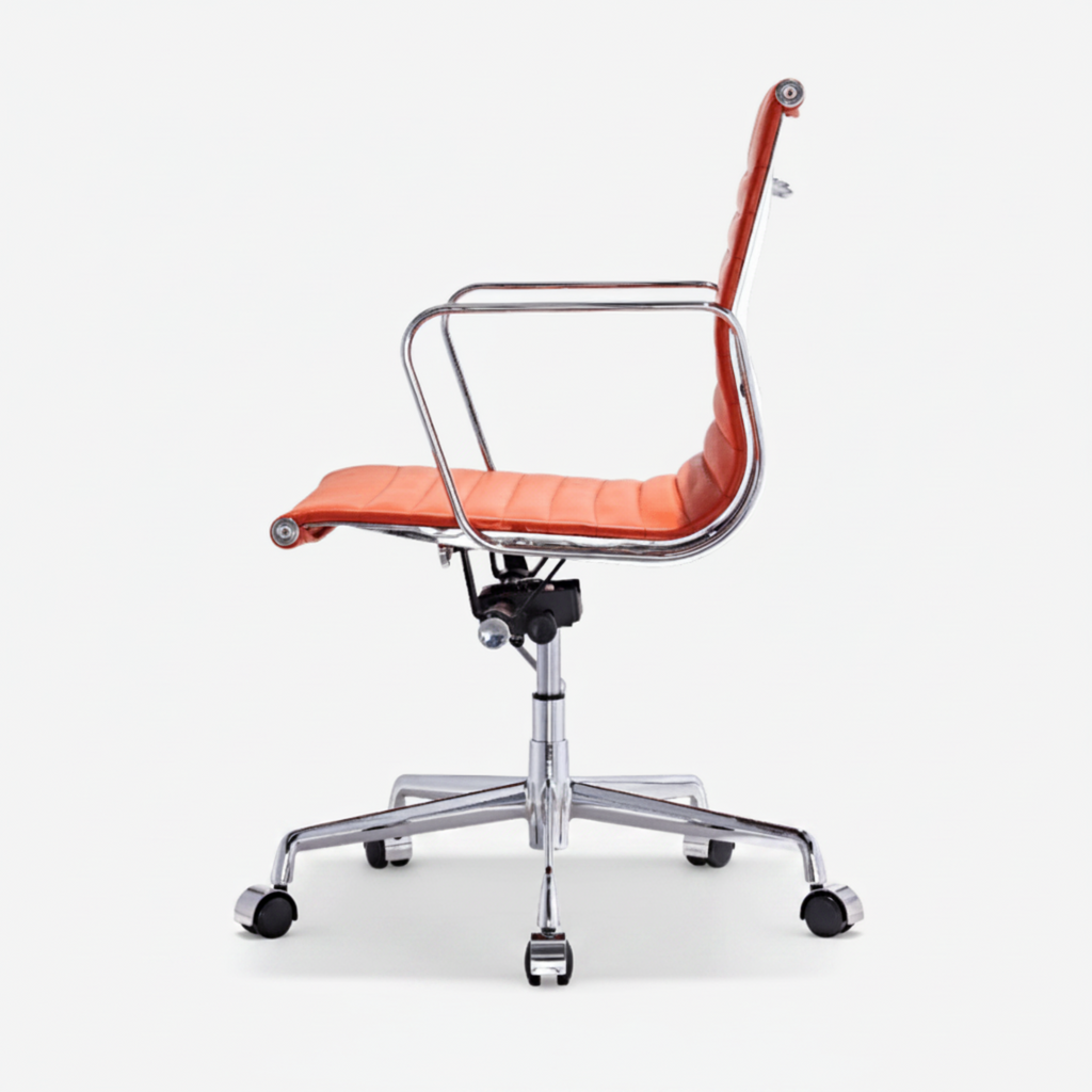 An orange leather office chair with a chrome metal frame and five-star base on a light gray background.