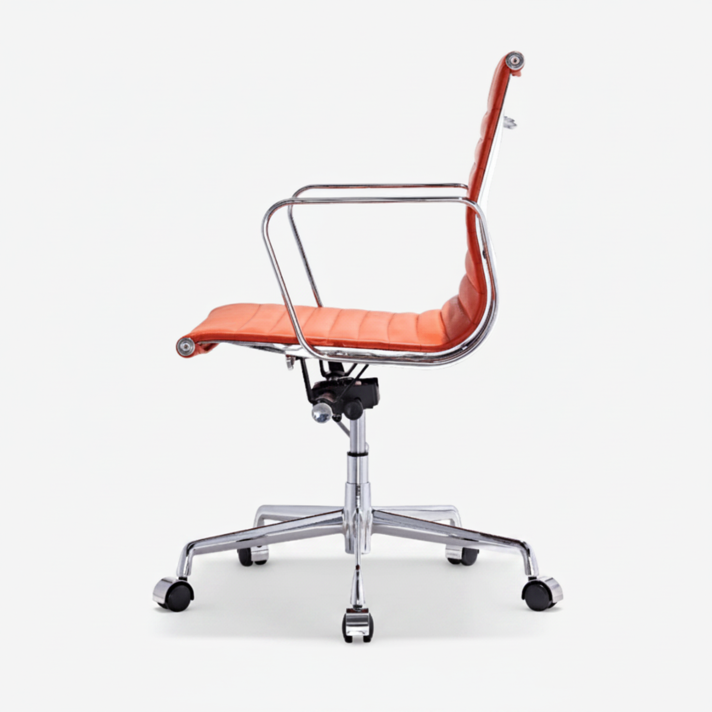 An orange leather office chair with a chrome metal frame and five-star base on a light gray background.