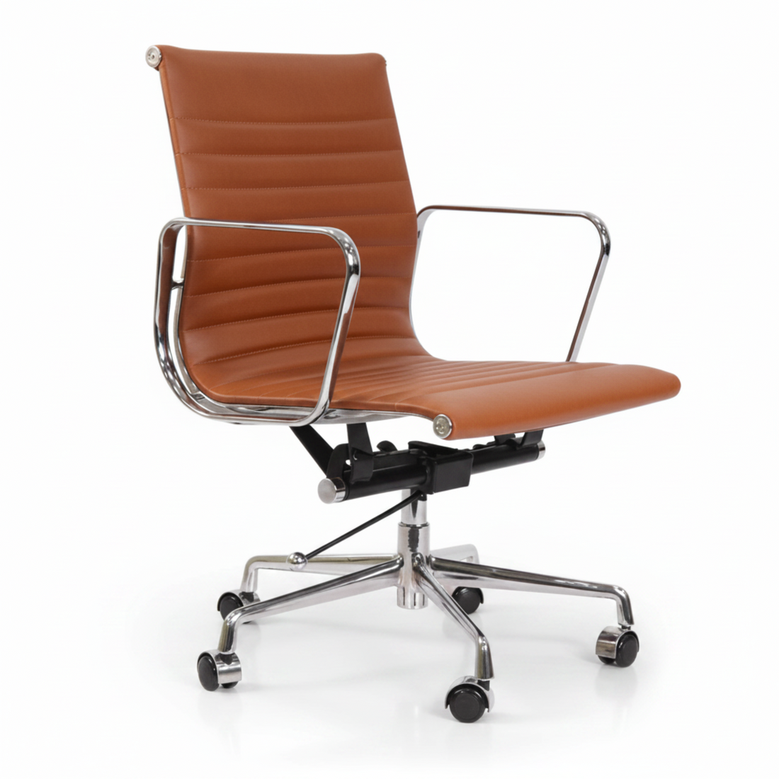 A modern office chair with a curved, ribbed cognac brown faux leather seat and backrest, supported by a chrome-finished metal frame
