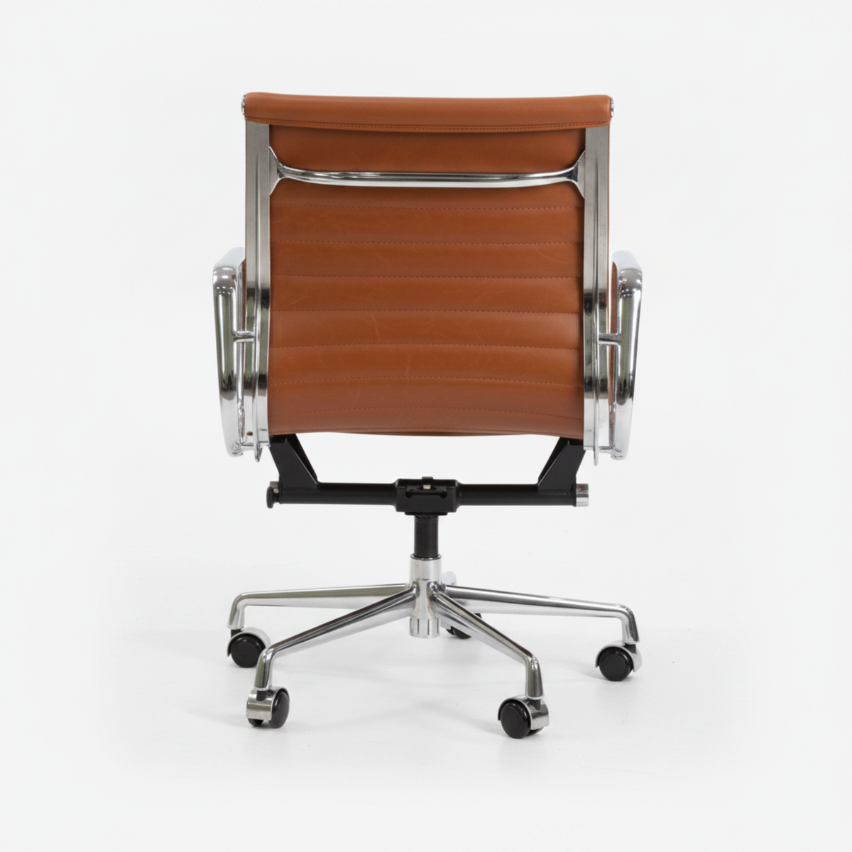 A modern office chair with a brown leather seat and backrest, supported by a polished chrome five-star base with casters