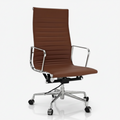 A modern high-back office chair with a brown ribbed faux-leather seat and backrest, supported by a chrome five-star base with black casters.