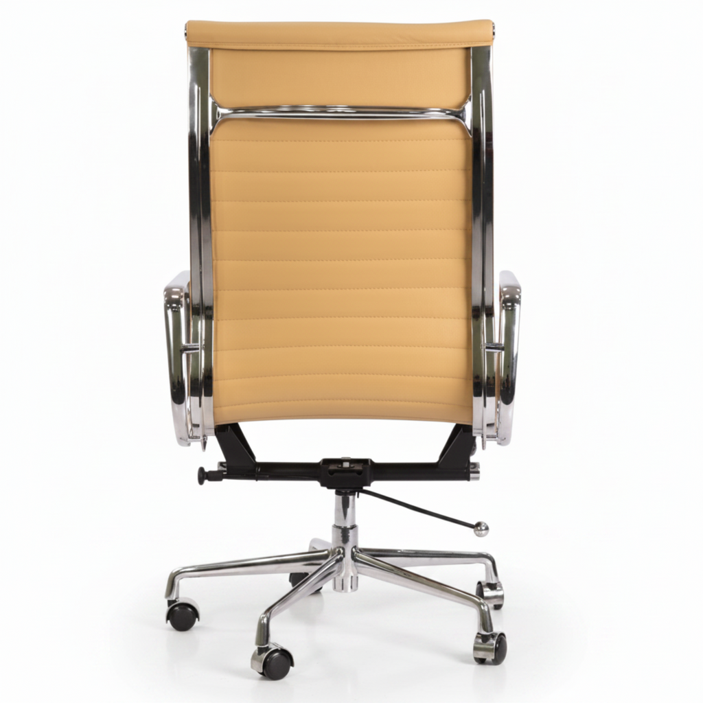 A modern office chair with a tan padded seat and backrest, supported by a polished chrome five-star base with casters.