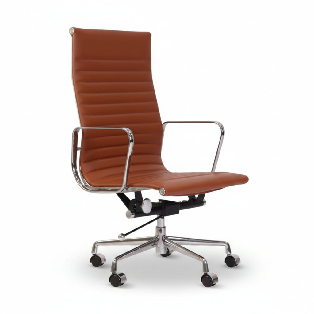 A modern high-back office chair with a ribbed brown leather or faux-leather seat and backrest