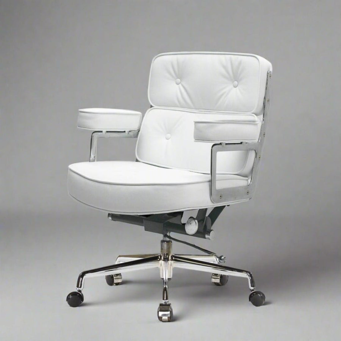 A modern white upholstered executive-lobby-office-chair-es104-white with tufted back and seat cushions, chrome metal arm supports