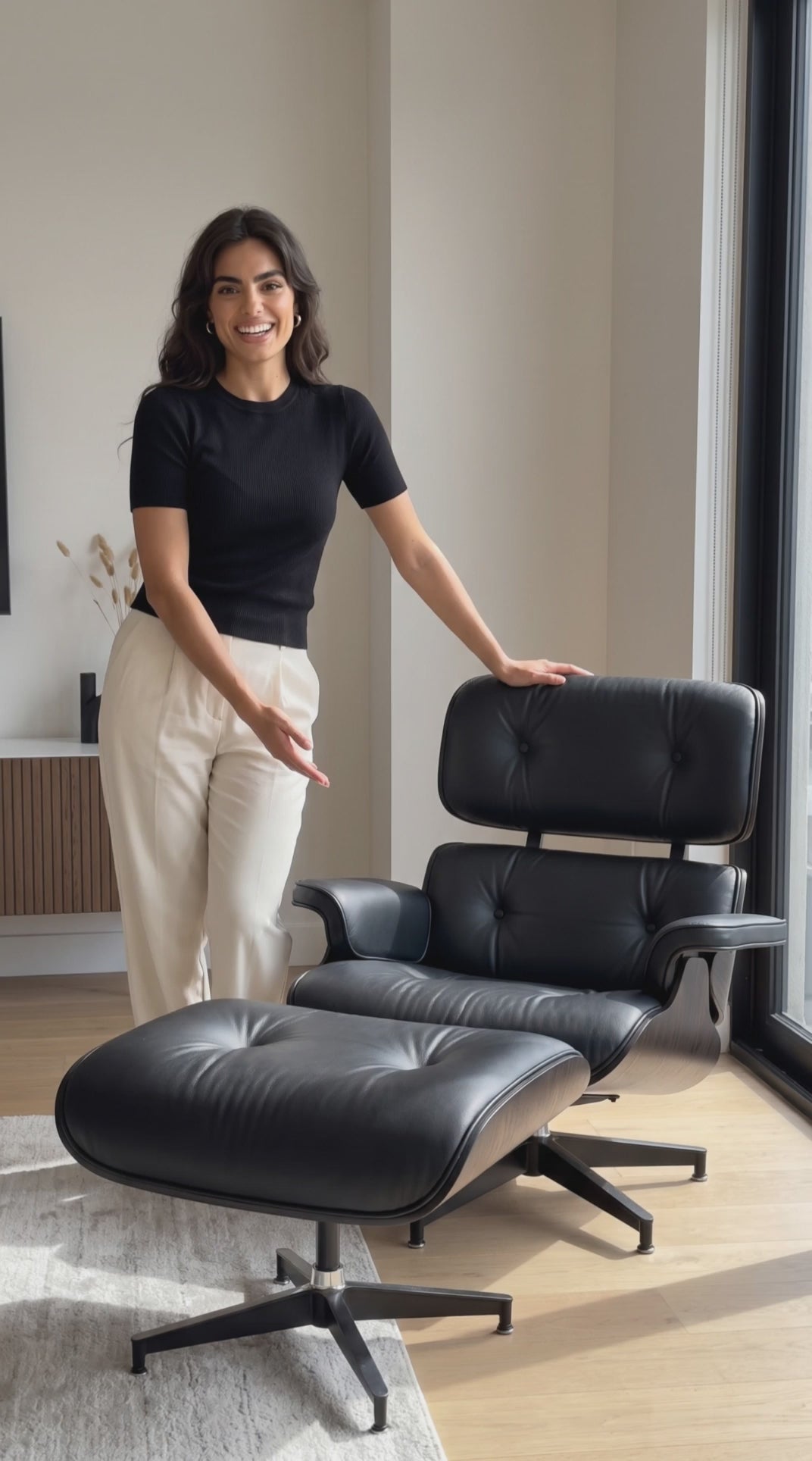 Video of Girl talking about the Lounge Chair and Ottoman Ebony Ash Wood Black
