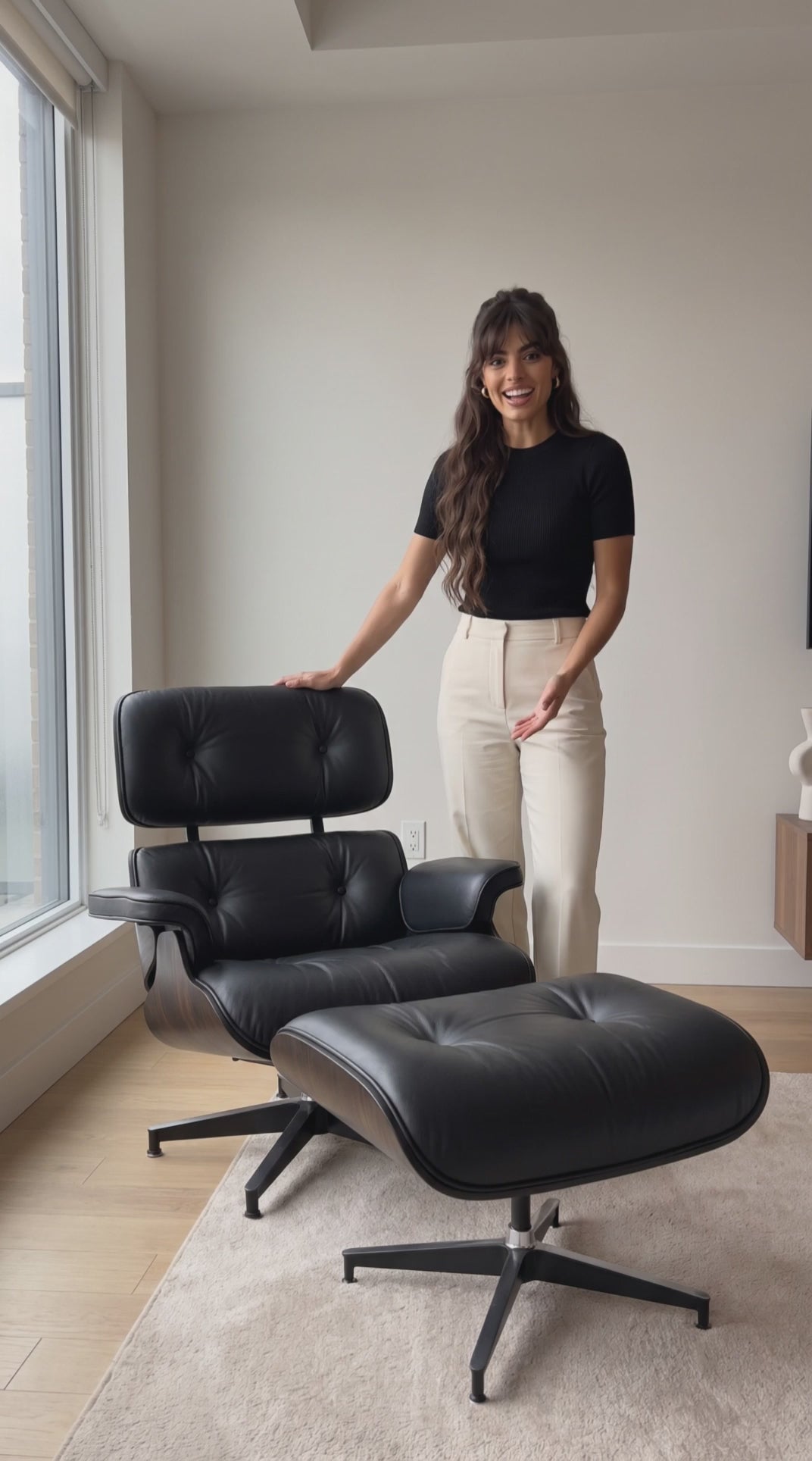 Video of Girl talking about the Lounge Chair and Ottoman Ebony Ash Wood Black